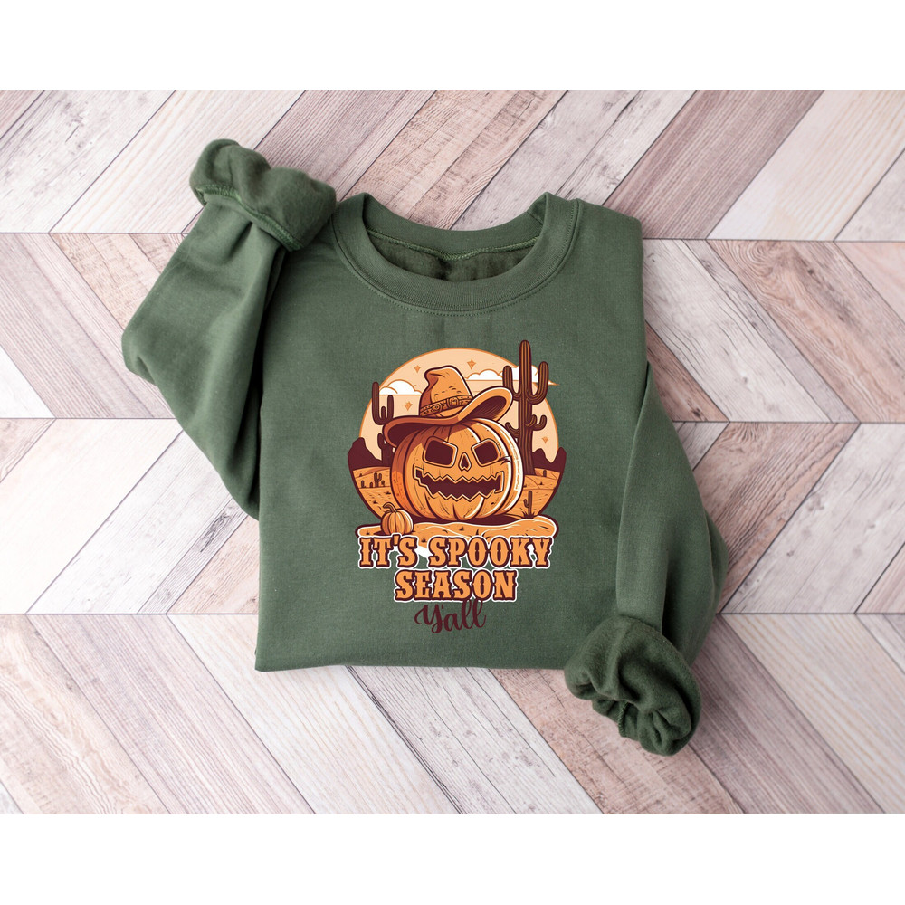 It's Spooky Season Y'all Sweatshirt, Halloween Shirt, Pumpkin Shirt, Western Halloween Sweatshirt, Cowboy Pumpkin Shirt, Cute Spooky Sweater.jpg