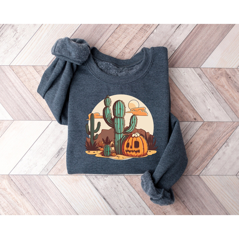 Western Pumpkin Halloween Sweatshirt,Halloween Shirts,Pumpkin Western Shirt,Spooky Western Shirt,Western Halloween Sweatshirt,Halloween Gift.jpg