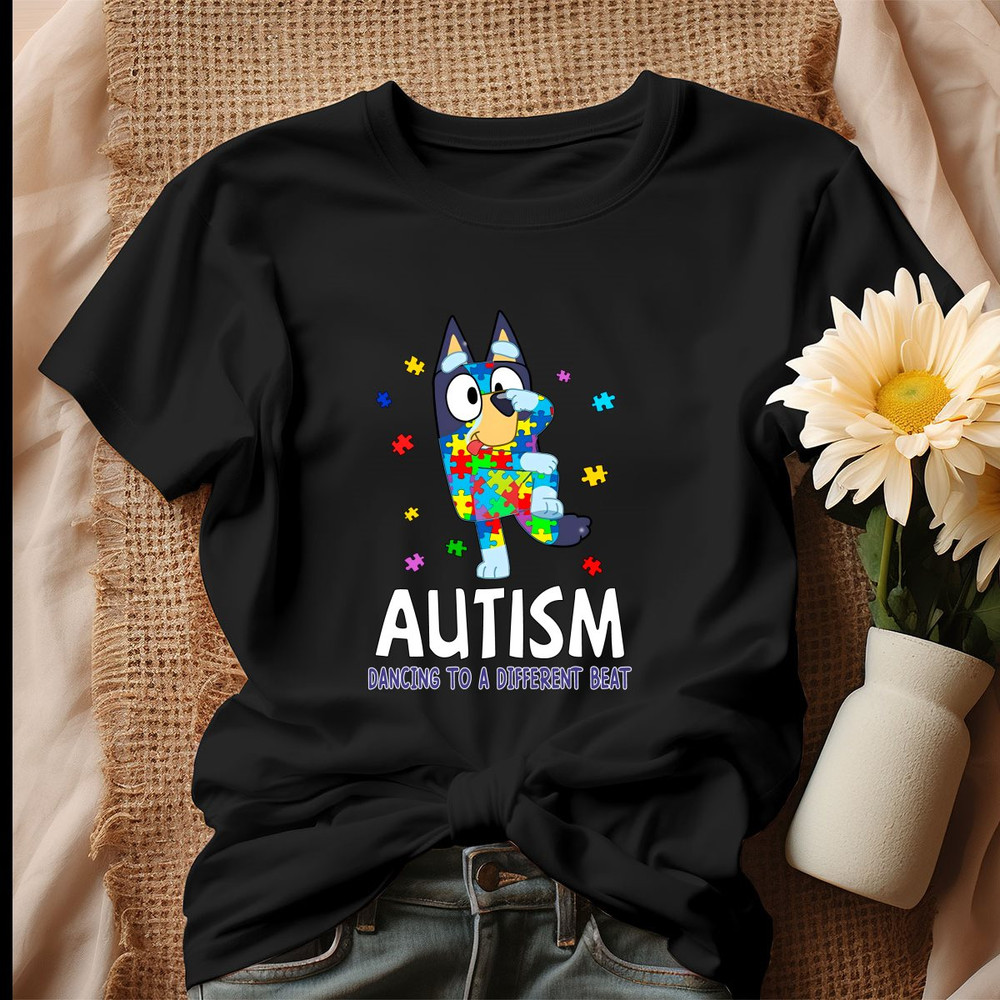 Bluey Autism Dancing To A Different Beat Shirt.jpg