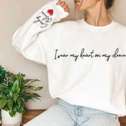 personalized i wear my heart on my sleeve sweatshirt hoodie, gift for mom, mama sweatshirt with children name on sleeve