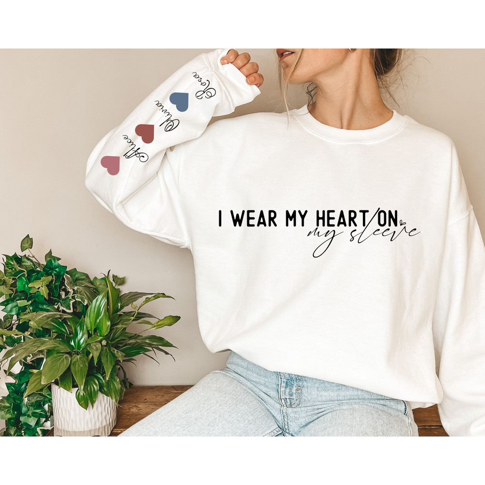 Personalized I Wear My Heart On My Sleeve Sweatshirt, Gift for Mom, Mama Hoodie with Children Name on Sleeve, Mothers Day Gift.jpg