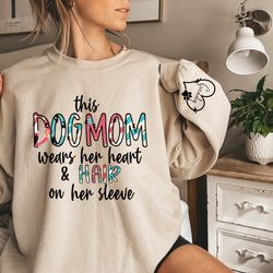 this dog mom wears her heart on her sleeve sweatshirt, dog paw, custom dog name shirt, dog mama, dog mom, dog lover shir