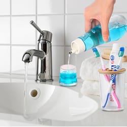 clear glass mouthwash dispenser bottle with lid for bathroom countertop refillable use