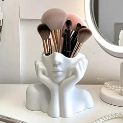 minimalist face sculpture makeup brush holder desk organizer