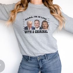 mama im in love with a criminal, names on sleeve, with a criminal sweater