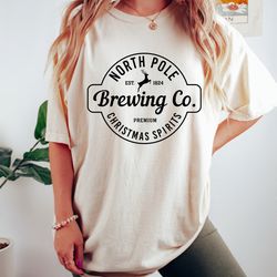 north pole brewing co oversized vintage t-shirt, comfort colors shirt, christmas spirit shirt