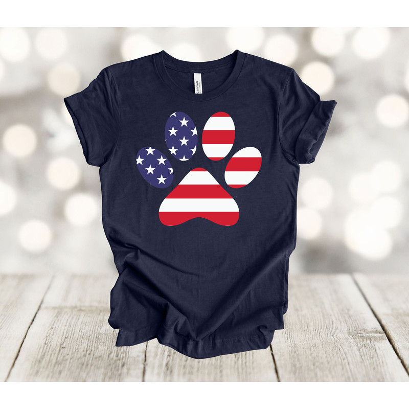 Independence Day Shirt, July 4th Paw Prints, Dog Lover, Red White And Blue Paws, Premium Soft Unisex Tee, Plus Size 2x, 3x, 4x Available.jpg