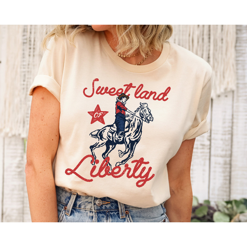 Liberty City Cowboy 4th of July Shirt, Sweet Land Liberty Cowboy, Western Retro Cowboy Tee, Cowboy of the Liberty City, Summer Tee, USA Tee.jpg