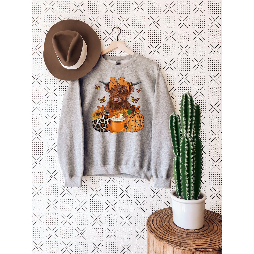 Howdy Fall Cow Sweatshirt, Cow Floral Pumpkin Sweater, Fall Western Cow Shirt, Retro Fall T-Shirt, Country Fall Shirt.jpg