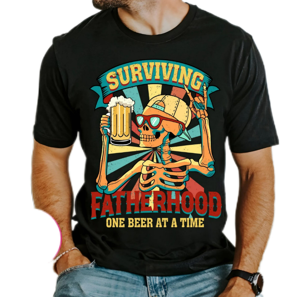 Surviving fatherhood one beer at a time,dad bod shirt,fatherhood shirt,funny skeleton dad,best dad ever,dad shirt gift