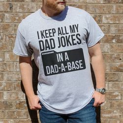 i keep all my dad jokes in a dad a base tee