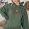Snoopy Skiing Nike Logo Embroidered Sweatshirt Christmas Xmas.jpg