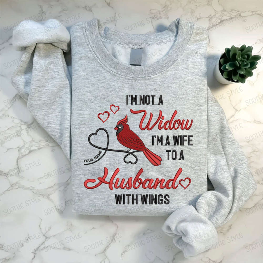 I'm Not A Widow I'm A Wife To A Husband With Wings Embroidered Sweatshirt For Family.jpg