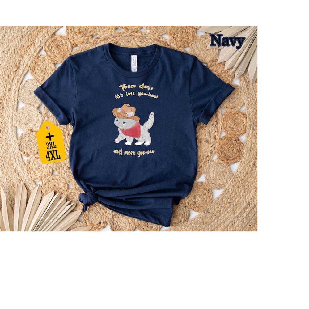 These Days It's Less Yee-haw And More Yee-naw Shirt, Cat Shirt, Animal Lover Shirt, Cowboy Cat Shirt, Western Shirt, Cow.jpg