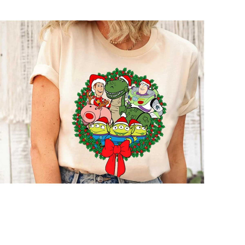 Disney Toy Story Group Christmas Wreath Shirt, Santa Aliens Woody Buzz Jessie,Christmas Vibes Sweatshirt,Disneyland Chri.jpg