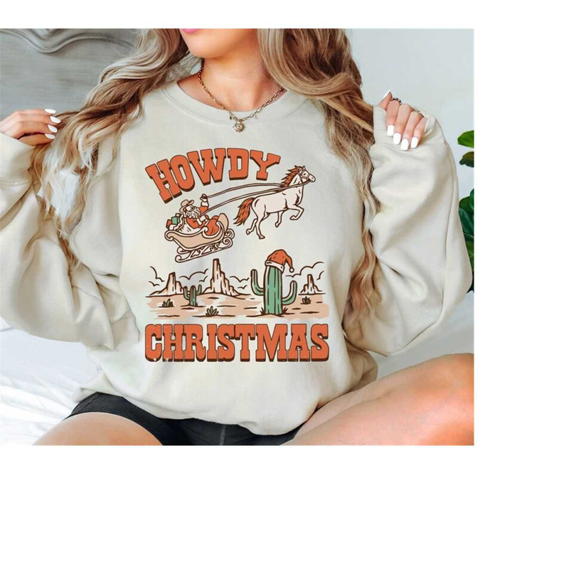 Howdy Christmas Sweatshirt, Santa Western Shirt, Cowgirl Santa Shirt, Country Merry Christmas Shirt, Retro Western Howdy.jpg