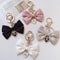Elegant Pearl Ribbon Keychain For Women Bag Charm Accessories 0