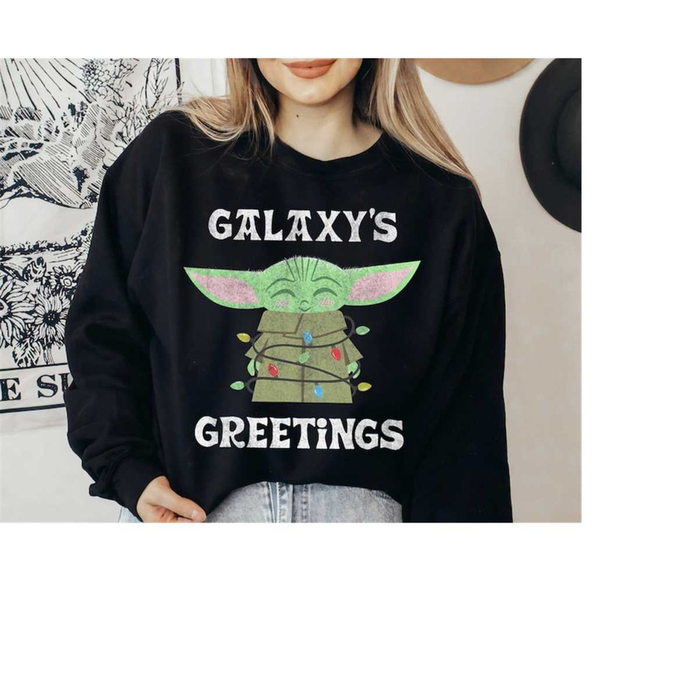 Star Wars The Mandalorian Christmas Child Galaxy's Greetings T-Shirt, Baby Yoda Christmas Lights Shirt, Star Wars Disney.jpg