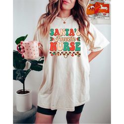 comfort colors christmas gift for santas favorite nurse, christmas santas nurse shirt, nurse christmas gift, nurse lif