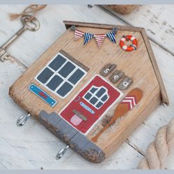 The housekeeper of the fisherman's house. An original gift and home decor in a nautical style, made of driftwood, sea