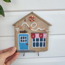 The housekeeper of the cafe by the sea. An original gift and decor for a marine-style house from driftwood, for keys