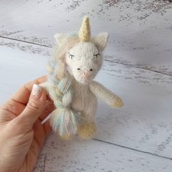 Knitted stuffed unicorn with rainbow mane Magical soft unicorn doll sleep