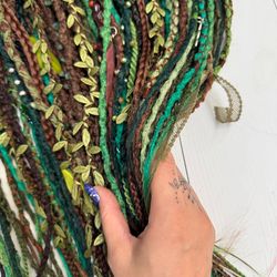 forest dreads – brown and green crochet dreadlocks with leaves, feathers & nature-inspired textures