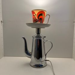 Table lamp made from an antique coffee pot and tea cup