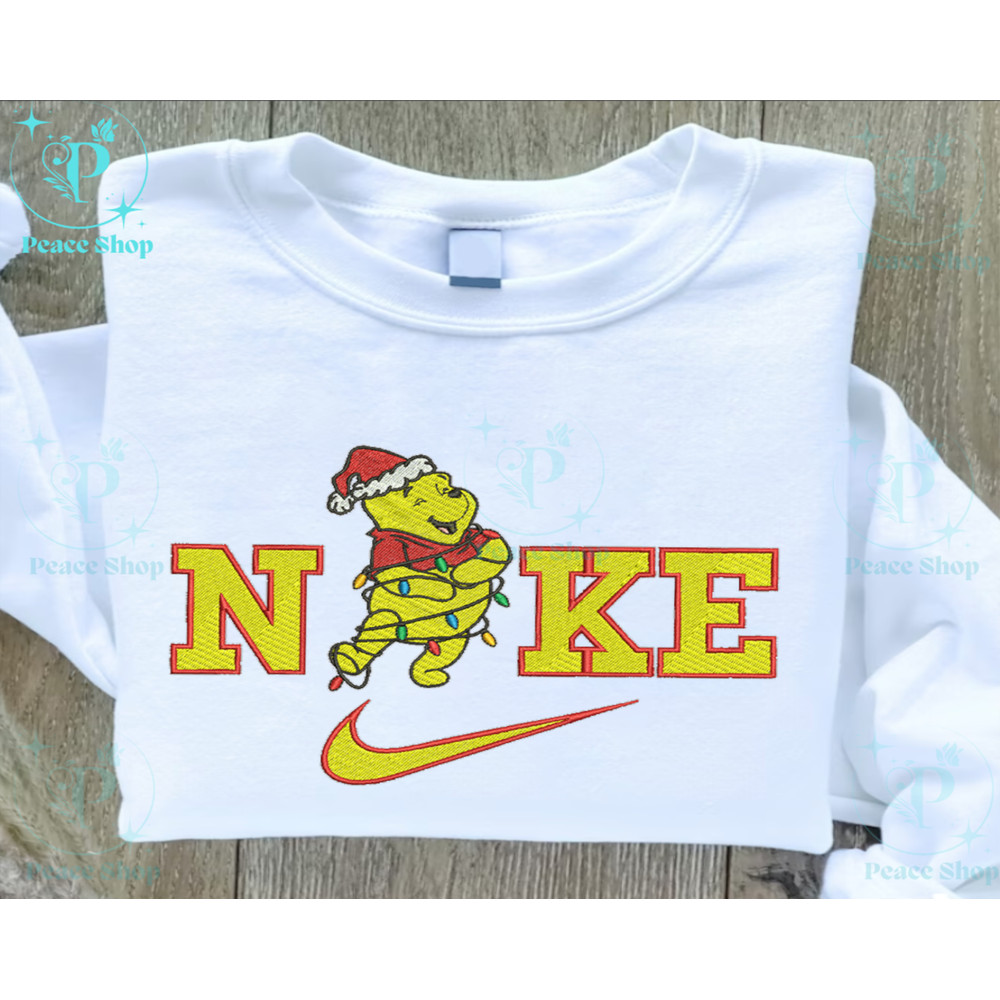 Nike Winnie The Pooh Christmas Lights Embroidered Sweatshirt, Christmas Embroidered Sweater, Nike Hoodie, Unisex Shirt.png