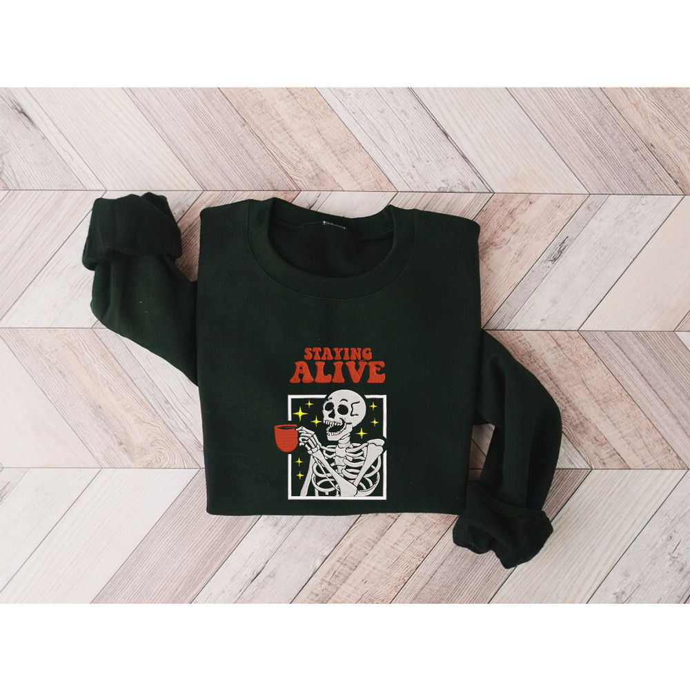 Embroidered Staying Alive Coffee Sweatshirt, Trendy Sweatshirt, Spooky Season Crewneck Trendy Coffee Sweatshirt, Halloween Embroidered Gift.jpg