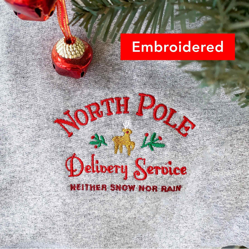 North Pole Vintage Christmas Sweatshirt, Reindeer crewneck embroidered.jpg