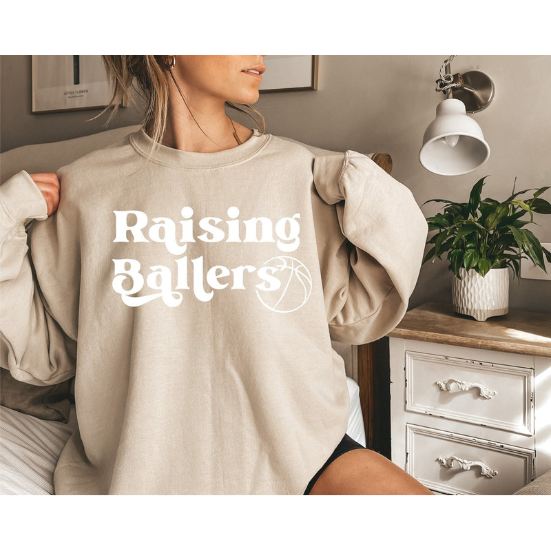Basketball Mom Shirt Raising Baller, Basketball crewneck for Mom, Basketball Mom crewneck Game Day Basketball Mom Tee 2.jpg