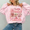 I Teach the Cutest Little Sweetheart Sweatshirt, Candy Hearts Valentines Day Shirt, Perfect Gift for Elementary or Daycare Teachers.jpg