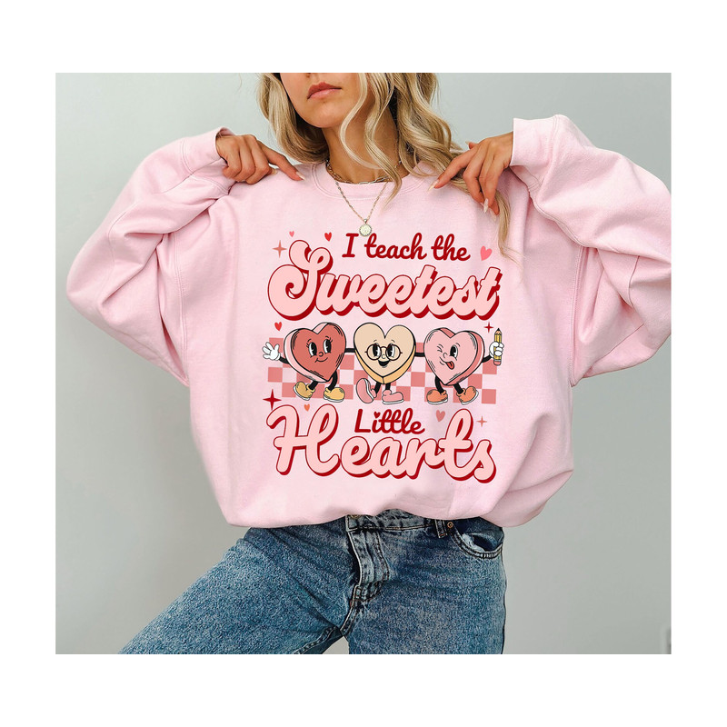 I Teach the Cutest Little Sweetheart Sweatshirt, Candy Hearts Valentines Day Shirt, Perfect Gift for Elementary or Daycare Teachers.jpg