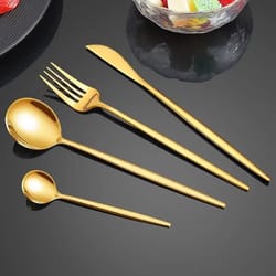 golden stainless steel cutlery set – knife, fork, spoon, and teaspoon for elegant dining