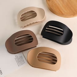 flat circular hair clip with duckbill grip, strong teeth, comfortable curved design