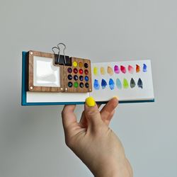 Wooden watercolor palette, with sketchbook