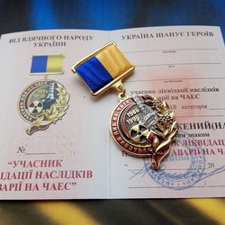 UKRAINIAN CHERNOBYL MEDAL "PARTICIPANT - LIQUIDATOR OF ACCIDENT IN CHERNOBYL". MEMORY TO HEROES. GLORY TO UKRAINE