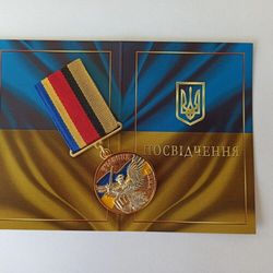 UKRAINIAN AWARD MEDAL "PARTICIPANT OF THE WAR" WITH DOCUMENT. GLORY TO UKRAINE