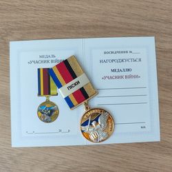 UKRAINIAN AWARD MEDAL "PARTICIPANT OF THE WAR. PISKY" WITH DOCUMENT. GLORY TO UKRAINE