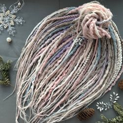 Handmade mix dreadlocks In the most delicate shades of blue, pink, lilac