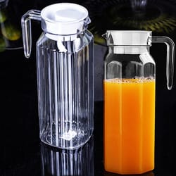 plastic water juice jug pitcher transparent bottle for storing fresh juices and drinks for fridge storage