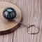 Mini Outdoor Compass Keychain with Liquid Filled Navigation Ball for Hiking and Survival