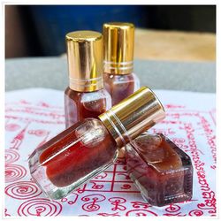 Charm oil (Namman Sanae maha Long) for several different purposes, namely to attract manifold blessings of good luck, lo