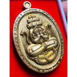 Experience higher fortune, enhanced charm, and increased popularity with this sacred amulet (Phra Pidta Phang Phra Kan)