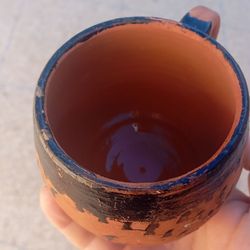 Handmade Moroccan Clay Cup adorned with traditional tar paint
