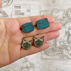 Interesting handmade earrings. For cat lovers).