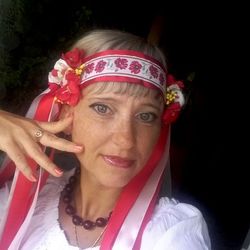 wreath on the head in folk ukrainian style, with multi-colored ribbons,flowers,ornamental ribbon,folk ornament,unique