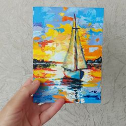 The author's oil painting "Sailboat at sunset"