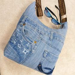 Practical and comfortable blue hobo bag, handmade from recycled denim - with pockets and adjustable strap